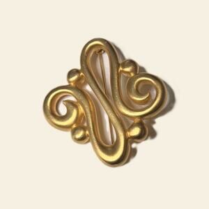 Gold Sculptural Swirl Brooch — Unsigned Givenchy Style (Vintage)